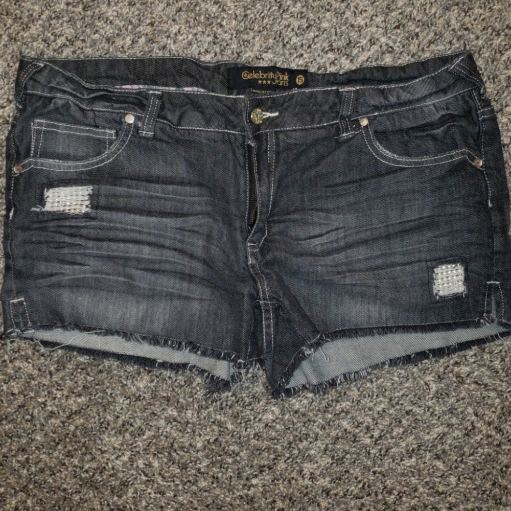 Grey denim shorts.